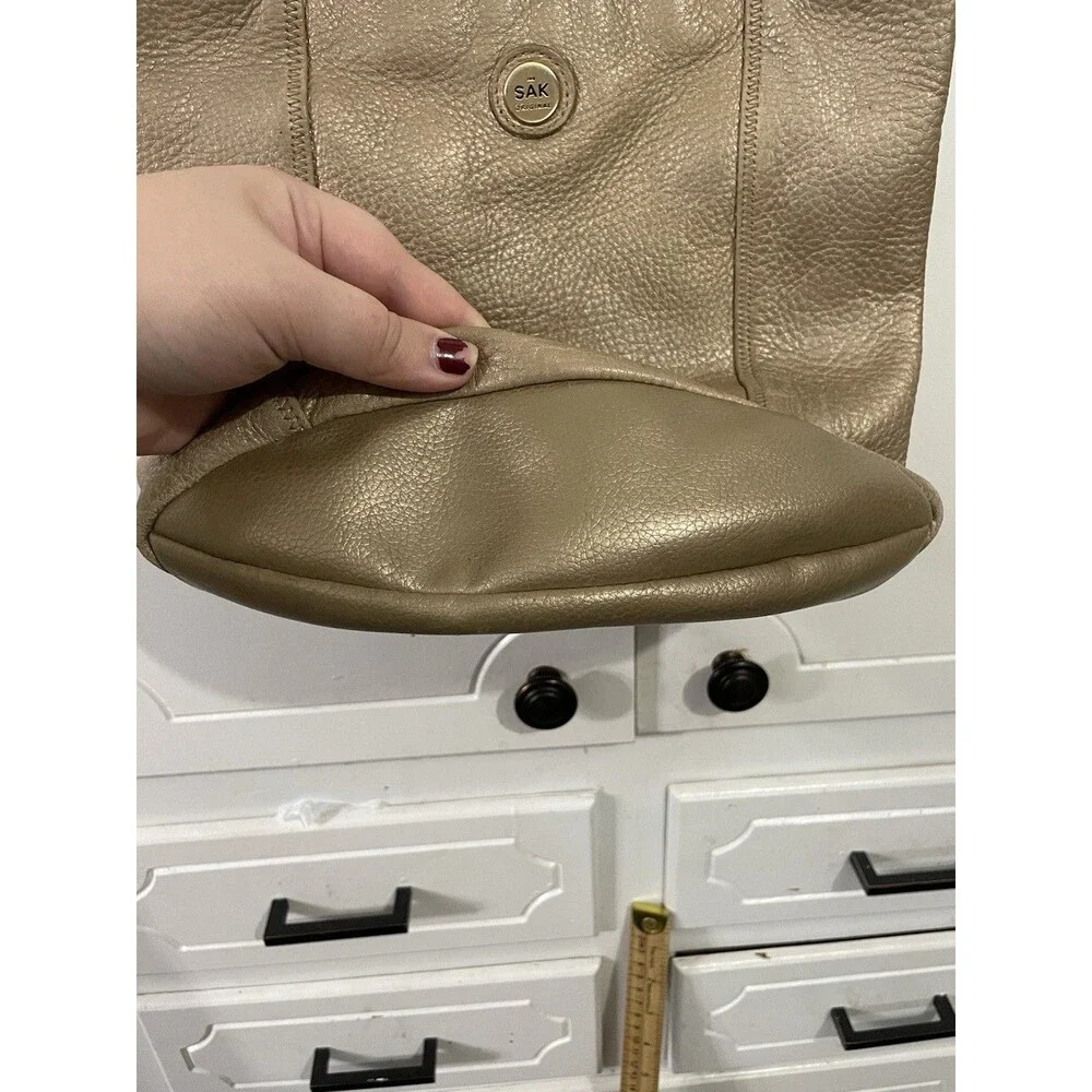 The SAK Gold Pebbled Leather Hobo Shoulder Bag Purse Single Strap Handbag